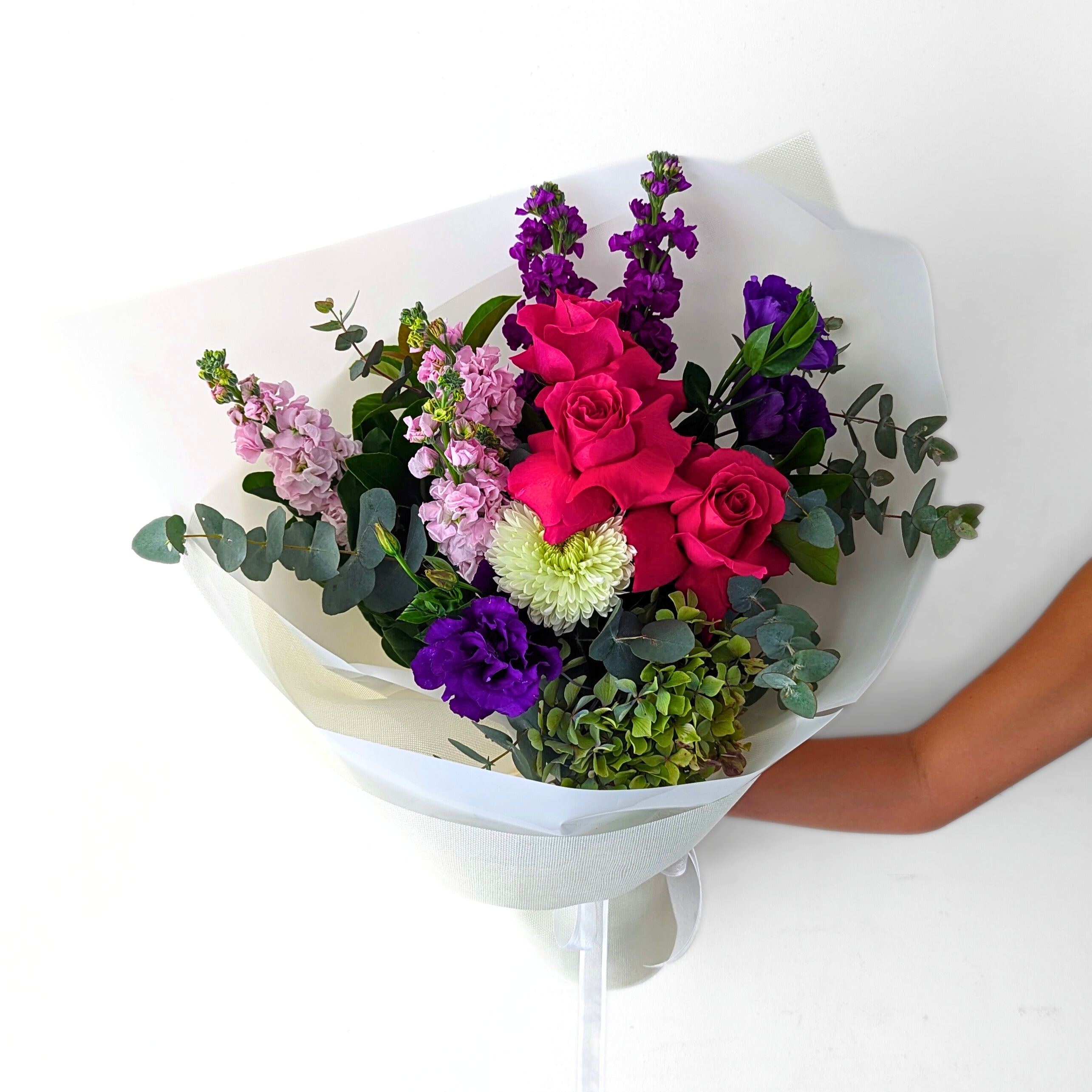 Vibrant Seasonal Bouquet-A bouquet with a variety of pink, purple, and green colors
