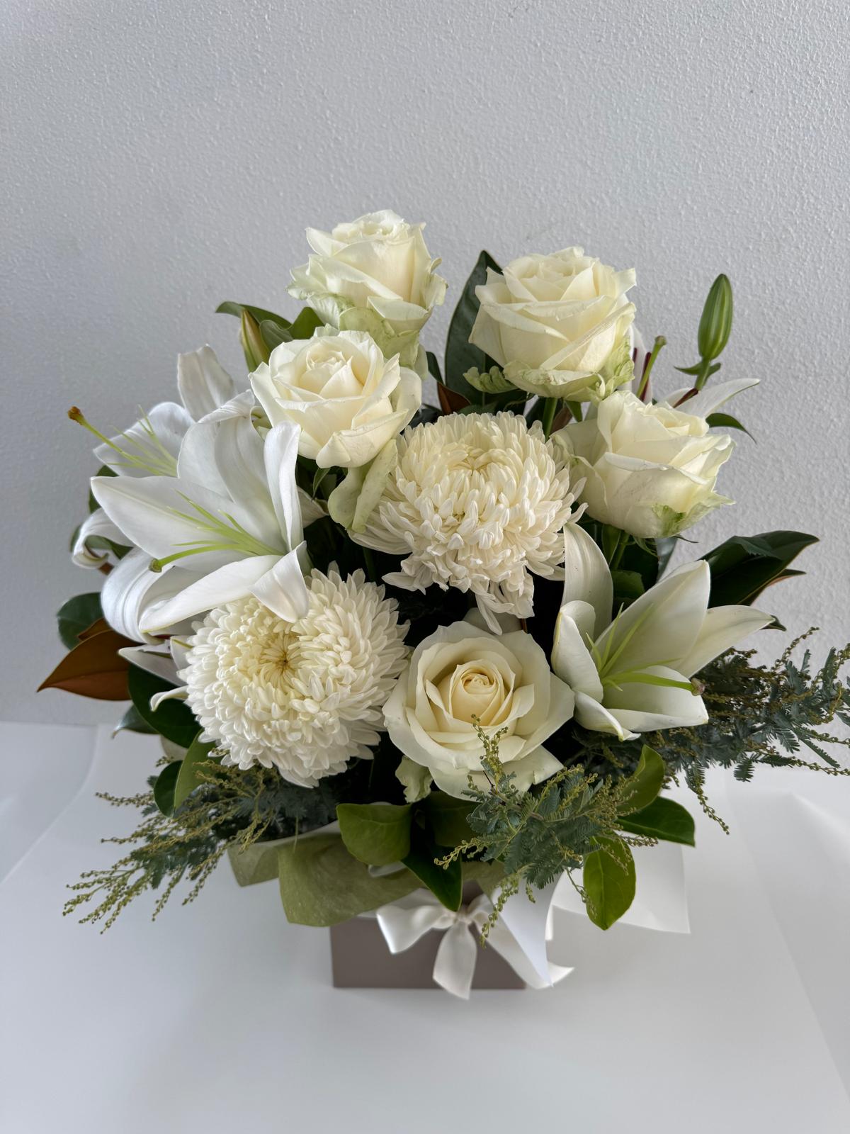 Harmony White-A fresh flower arrangement featuring white lilies, roses, and other seasonal flowers
